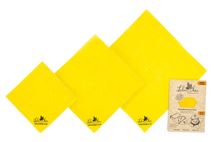 variation of sizes of beeswax wraps placed next to packaging